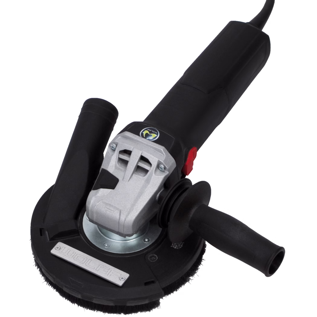 WOLFF_Dummy_80582_BS 125_2017-11 Close-up of a handheld electric angle grinder or polisher on a white background. The tool has a long black plastic body with an integrated power cord, a silver metal gearbox housing near the head, and a round attachment with a brushing or polishing pad and a protective guard. A removable side handle is mounted at the head for two-handed control, and a red rocker or slide power switch is visible on the side of the housing. A small metal nameplate and a circular logo are visible near the base of the head. The image focuses on the tool's functional details and materials—plastic grip, metal gearbox, and the abrasive/polishing disc—suitable for grinding, sanding or polishing surfaces.